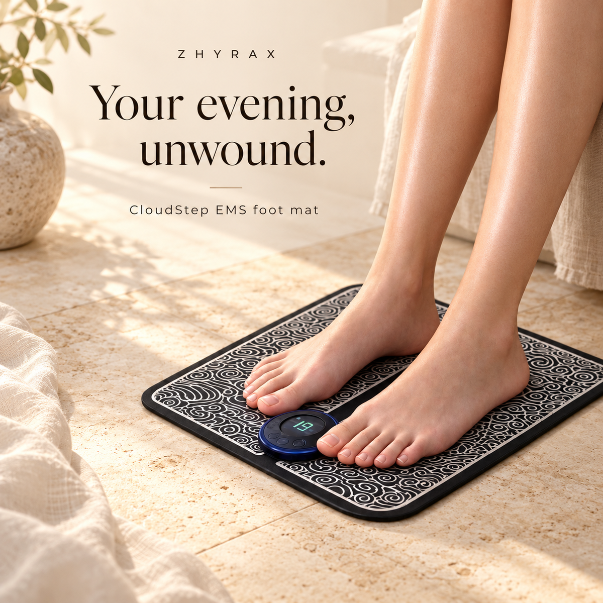 CloudStep EMS foot massage mat with round controller in a warm travertine setting